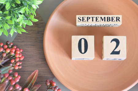 September 2, month design with flower and earthenware.の写真素材