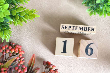 September 16. Number cube in natural concept on white leather for the backgroundの写真素材