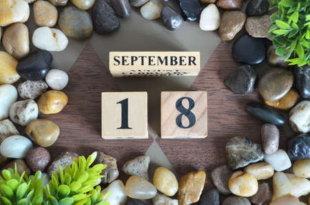 September 18, Background with number cube, colorful stone, design in the natural concept.の写真素材