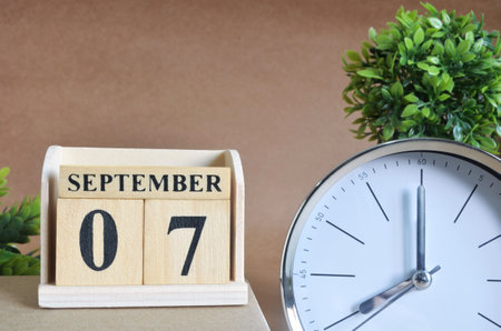 September 7, Cover design with silver - white clock in the natural concept.の写真素材