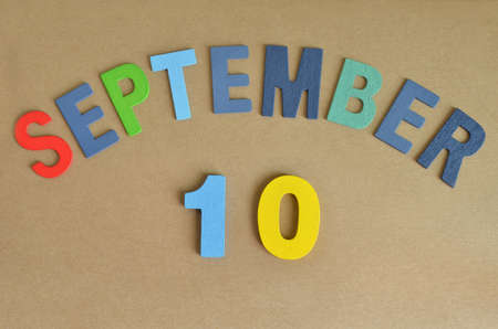 September 10, Toy alphabet with a brown background.の写真素材