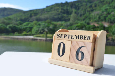 September 6, Date design with number cube on white table, cover design in the natural concept.の写真素材