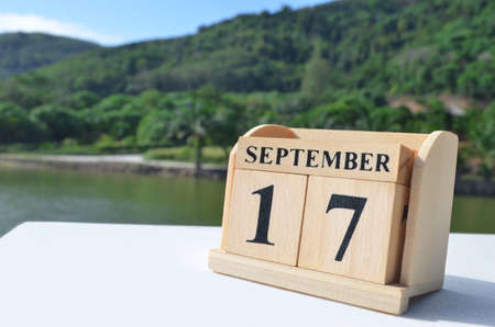 September 17, Date design with number cube on white table, cover design in the natural concept.の写真素材