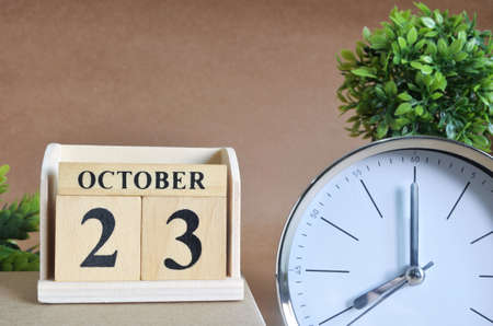 October 23, Cover design with silver - white clock in the natural concept.の写真素材