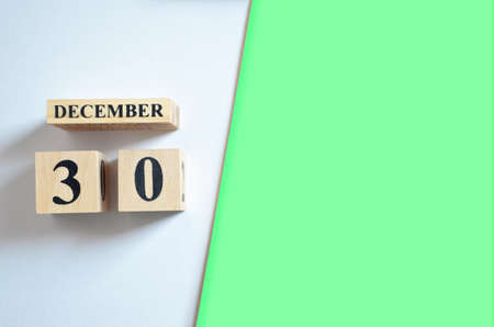 December 30, Empty white - Green background with number cube.の写真素材