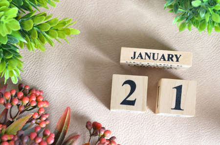 January 21. Number cube in natural concept on white leather for the backgroundの写真素材