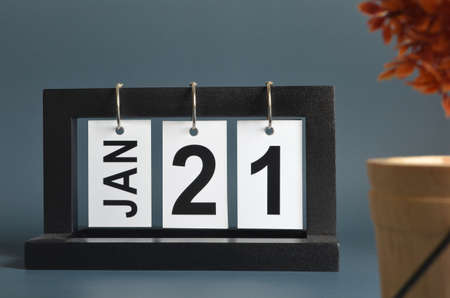January 21, Date design with a black wooden calendar for a business, Date Plans to the reminder.の写真素材