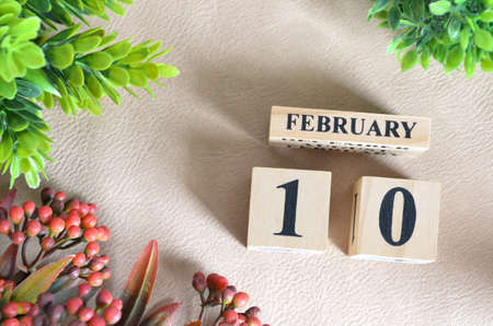 February 10. Number cube in natural concept on white leather for the backgroundの写真素材