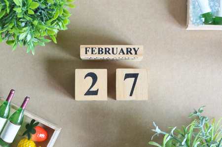 February 27, Date Background Design with number cube strawberry pineapple and wine in the natural concept.の写真素材
