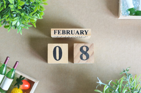 February 8, Date Background Design with number cube strawberry pineapple and wine in the natural concept.の写真素材