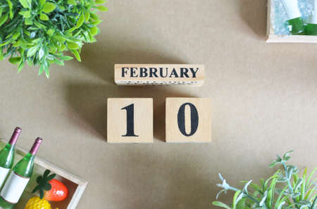 February 10, Date Background Design with number cube strawberry pineapple and wine in the natural concept.の写真素材