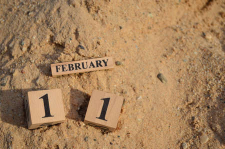 February 11, Number cube with Sand background.の写真素材