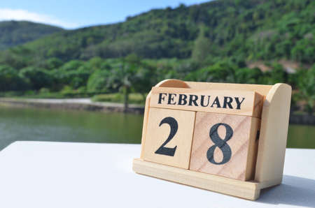 February 28, Date design with number cube on white table, cover design in the natural concept.の写真素材