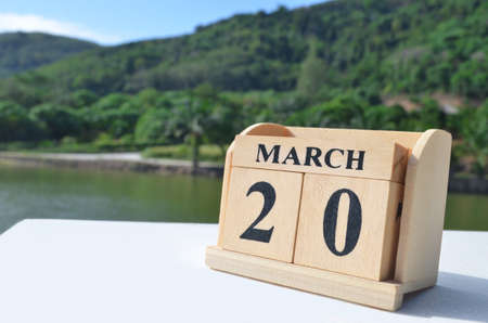 March 20, Date design with number cube on white table, cover design in the natural concept.の写真素材