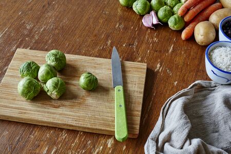 cutting scene with sprouts on tableの写真素材