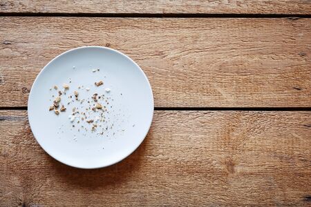 breadcrumbs on empty plateの写真素材