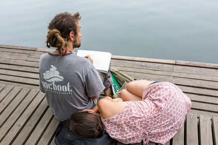 An artist is sketching the sceneryのeditorial素材