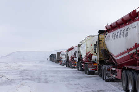 Transport vehicles at Tanggula Pass, Tibet, Chinaのeditorial素材