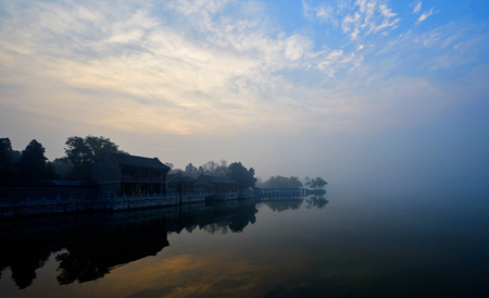Chinese ancient architecture building at lakeside viewの写真素材