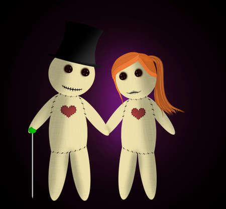 Lovers voodoo dolls are kept in handの写真素材