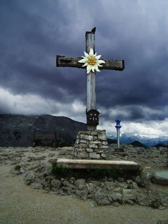 Kehlsteinhaus.   Raven on a cross in gloomy weatherの写真素材