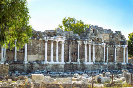 The ancient Nymphaeum fountain with beautiful columns in the city of Side. Landmark in Turkey.の写真素材