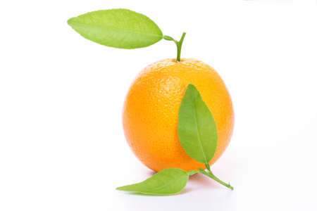 Fresh ripe orange with green leaf isolated on whiteの写真素材