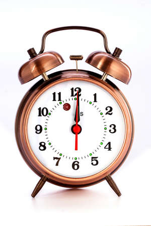 Old style alarm clock isolated の写真素材
