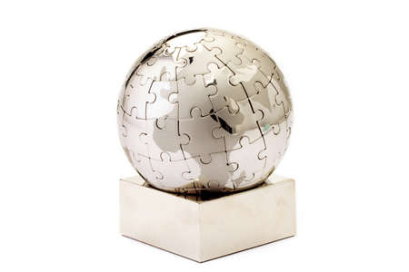 Metal puzzle globe isolated on white background の写真素材