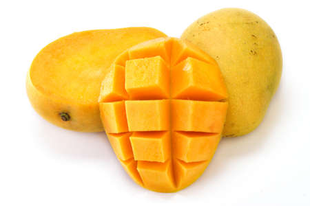 Mango fruit and slices isolated on white backgroundの写真素材