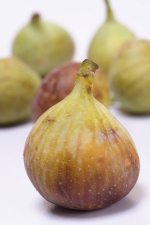 Fresh figs on white
