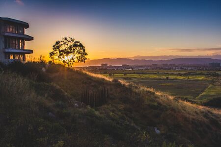 Dynamic sunset over the Ballona Wetlands from a scenic viewpoint on the Bluff Trail, Los Angeles, Californiaの写真素材
