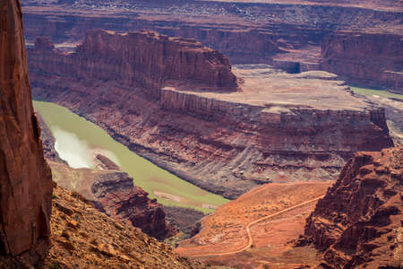 Dramatic overlook of the famous Colorado River winding through Canyonlands National Park, Dead Horse Point State Park, Moab, Utahの写真素材