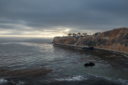 Gorgeous coastline view of Point Vicente and Pelican Cove at sunset with colorful clouds in the sky, Terranea Trail, Rancho Palos Verdes, Californiaの写真素材