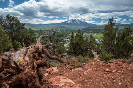 A captivating landscape showcases the beauty of Carbondale, Colorado, highlighting Mt Sopris and natural surroundings under a blue sky.の写真素材