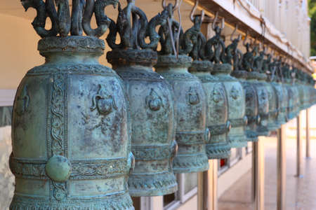 Collection of the bells at Thailand templeの写真素材
