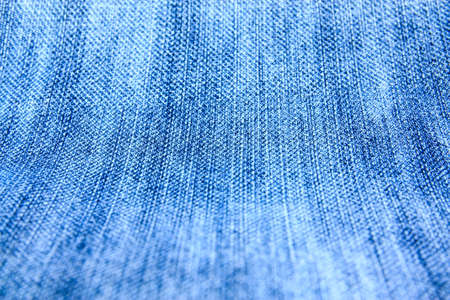 the picture of full frame background of a blue denim fabric pattern の写真素材