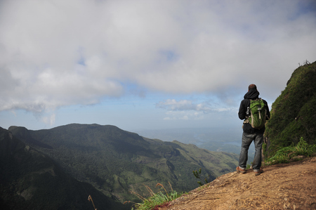 a man standing on the mountainのeditorial素材