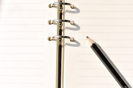 Journal and a pencilの写真素材