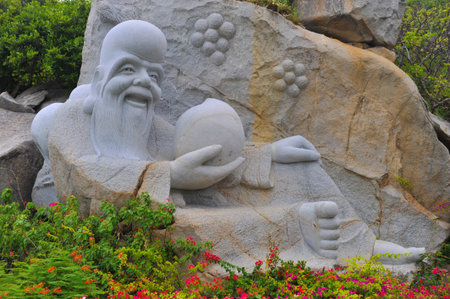 Carved statue at a gardenの写真素材