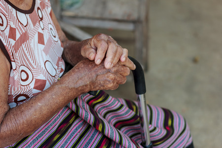 Closeup old hand with crutchの写真素材