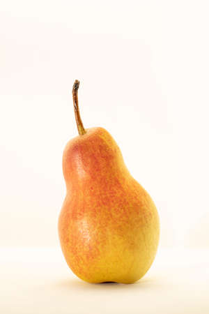 Yellow pear isolated on white backgroundの写真素材