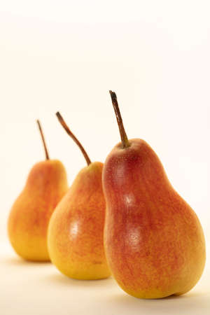 Yellow pears isolated on white backgroundの写真素材