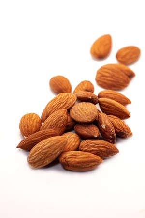Almonds isolated on white background.の写真素材