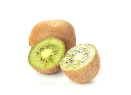 Kiwi fruit and slice isolated on white backgroundの写真素材