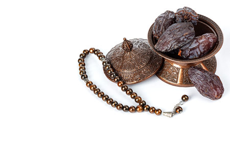 Dates on a bronze plate isolated.