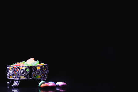 Colorful sweet candies on blackの写真素材