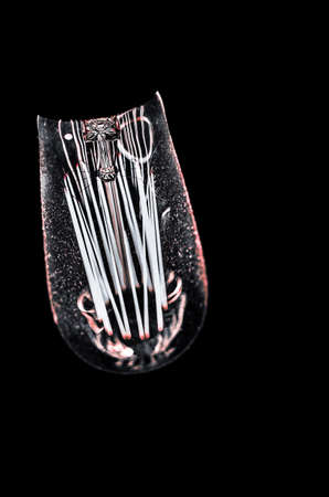 a retro lightbulb against a dark backgroundの写真素材