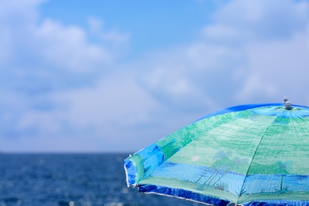Beach umbrella close up against a sea landscapeの写真素材