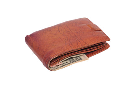 Purse with money for a white background close up